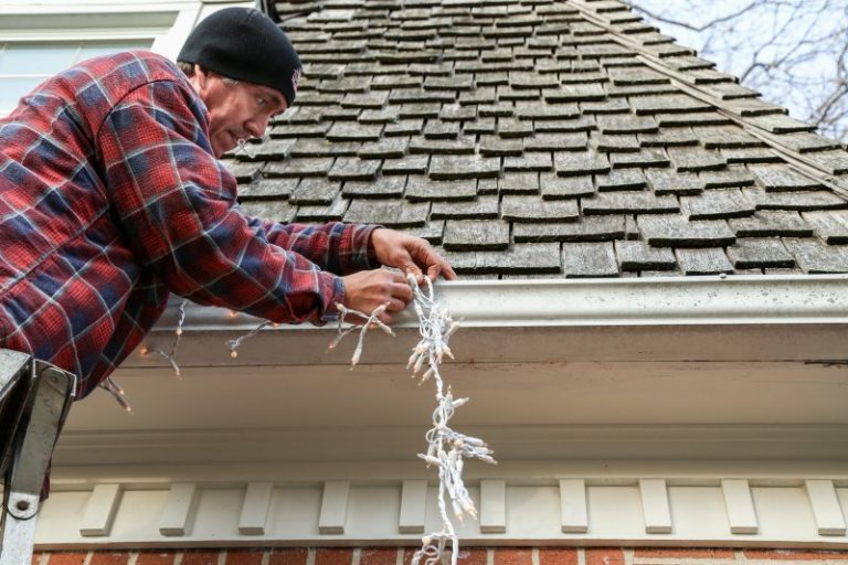 How to Safely and Effectively Hang Christmas Lights Onto Gutters