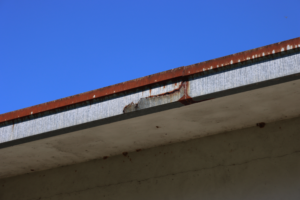 a rusted gutter system